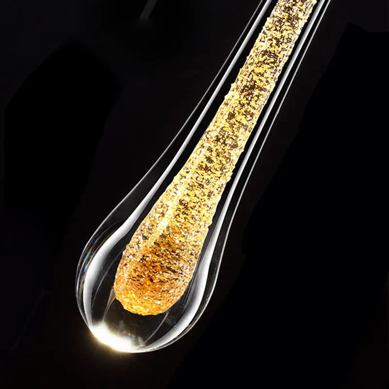 Elegant Raindrop Wall Sconce Lighting with Adjustable Height | Modern Glass Design for Warm Ambience 3