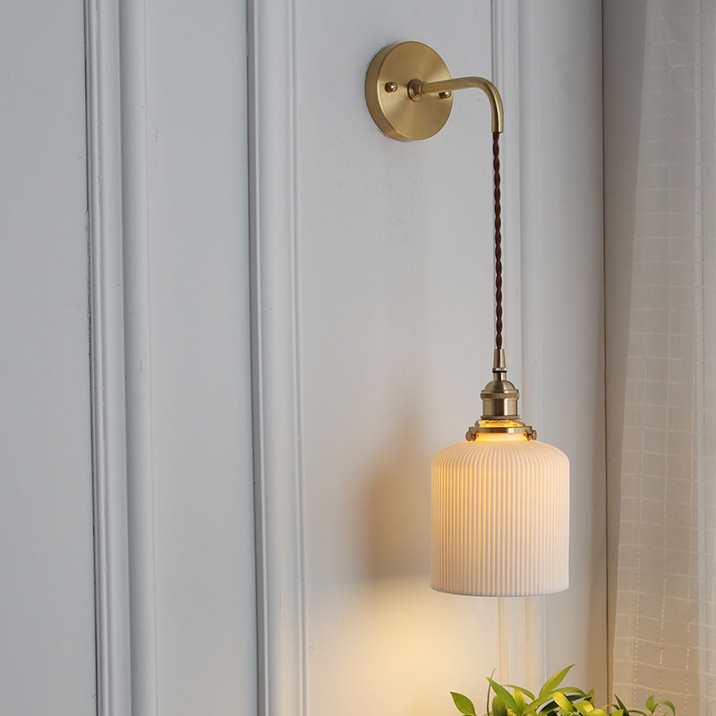 Juno Wall Sconce | Brass and Pleated Glass Design, Adjustable Height 1