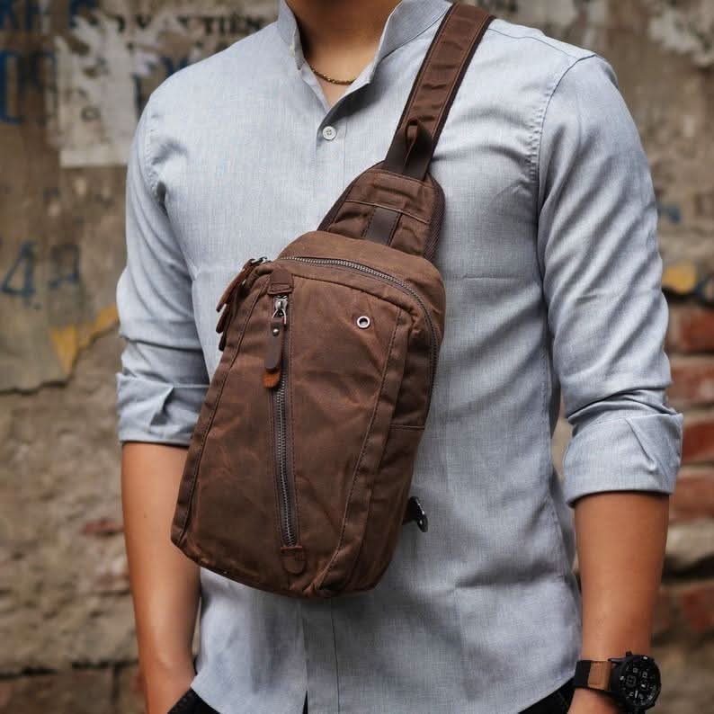 Canvas Sling Backpack, Sling Bags with Vegan Leather Trim and Multiple Compartments